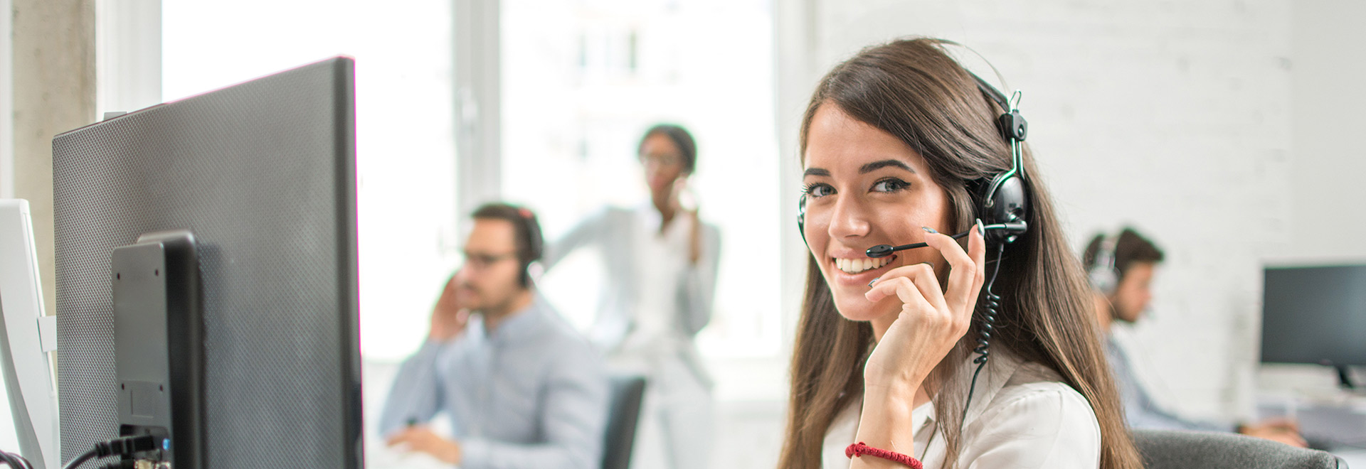 Call Center Mitarbeitern mit Headset