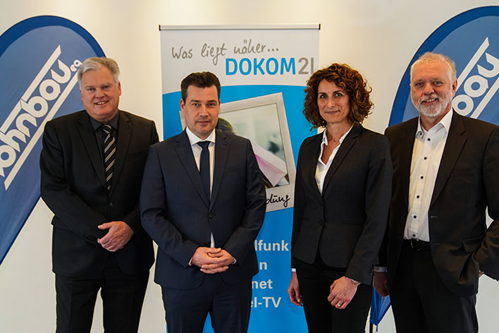 Vertreter von DOKOM21 und der Wohnbau eG Essen